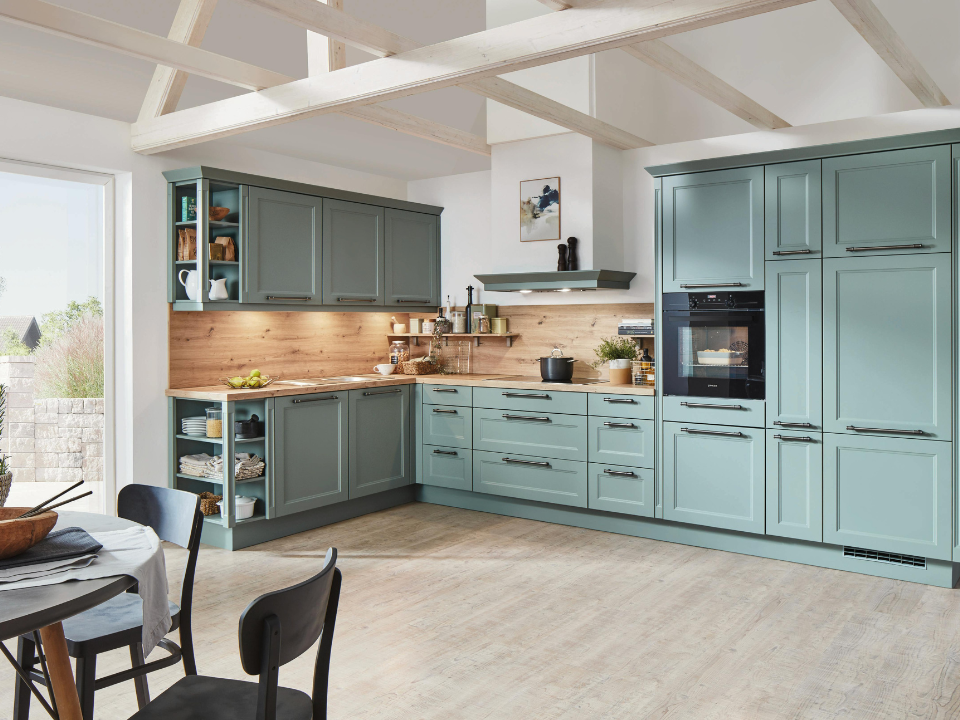 [background image] image of art supplies on a desk (for a graphic design studio)